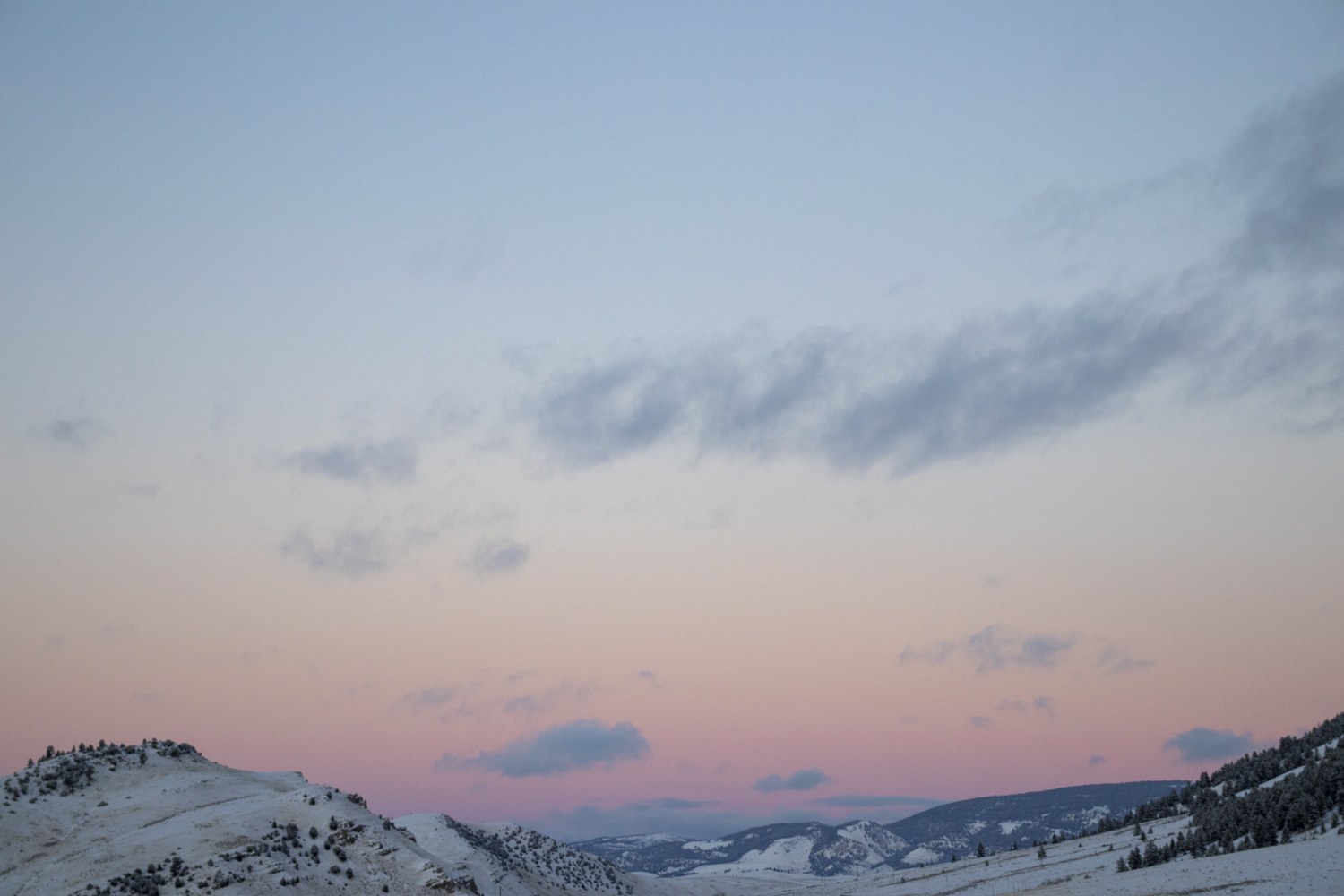 Sunset over the National Elk Refuge, the sky lit from below.
